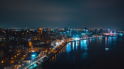 Fototapeta premium Nighttime Cityscape with Water Reflection