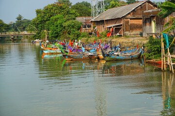 View of a group of fishing boats docked on the edge of the Jepara sea. Jepara, Indonesia