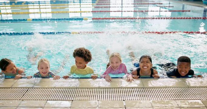 Swimming pool, group and kids exercise for health, fitness and learning to paddle together. Children, swimmer and happy students in water for lesson, training and practice cardio for sport at school