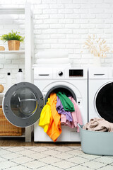 Overstuffed Washing Machine Door With Colorful Clothes