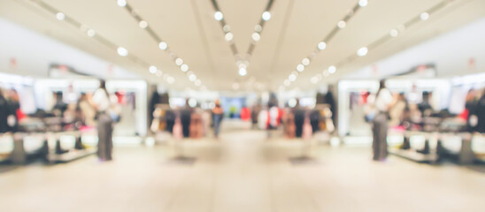 Abstract blur clothing boutique display interior of shopping mall background
