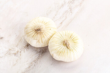 Raw white onion heap isolated