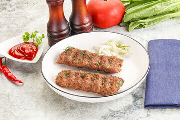 Kebab with beef served onion