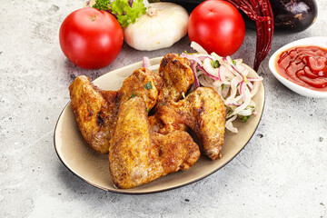Grilled chicken wings with sauce