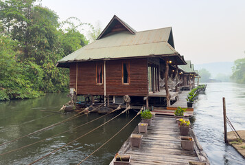 Fototapeta premium Fruit house on the river on the water