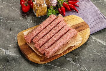 Raw beef kebab sausage for grill