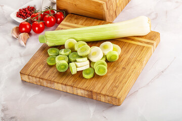 Ripe sliced leek over board