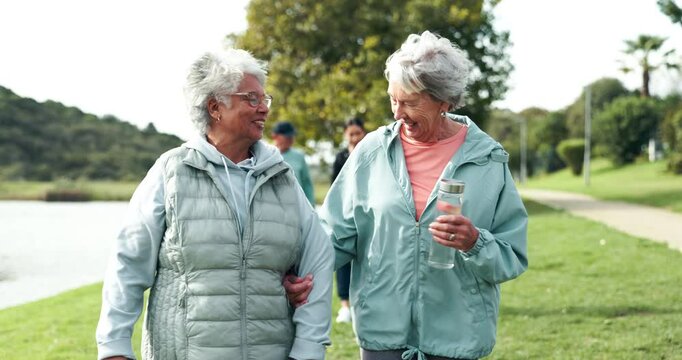 Fitness, walking and senior women in park outdoors together for bonding, exercise and relax in nature. Retirement, happy and old people in conversation for wellness, health and active lifestyle