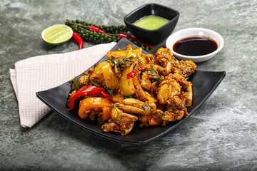 Vietnamese cuisine - fried frog with vegetables