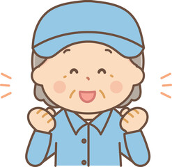 ガッツポーズをする作業服のシニア女性