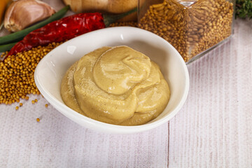 Dijon mustard sauce in the bowl