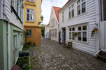 Scenic old town alley lined with cobblestones in Bergen, Norway
