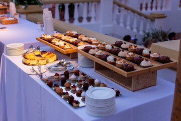 cake tasting table in a luxury event.