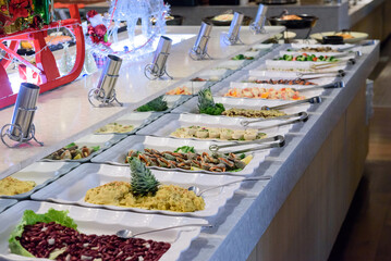 Korean buffet meal salad sushi dumpling fruit vegetable meat