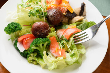 Korean buffet meal salad sushi dumpling fruit vegetable meat