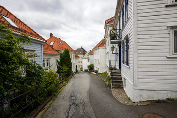 Charming old town street with old wooden buildings in Bergen, Norway