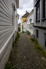 Charming old town alley with scenic cobblestone street in Bergen, Norway