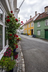 Charming old town street with old wooden buildings in Bergen, Norway