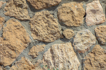 Wall of stones as a texture for background