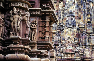 Reliefs and carvings on the walls of the temples Mahadeva and Devi Jagadambi. Khajuraho.Madhya Pradesh. India. Asia.
