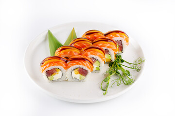 Fusion sushi roll with salmon and tuna on a plate, isolate