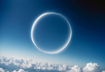 a circular shape is seen in the blue sky with fluffy clouds