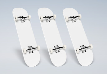 Three white skateboards mockup isolated on blank. 3D rendering