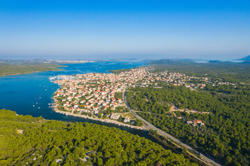 Aerial view of Adriatic town of Pirovac and main road, Dalmatia, Croatia