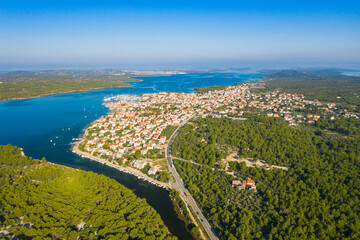 Aerial view of Adriatic town of Pirovac and main road, Dalmatia, Croatia