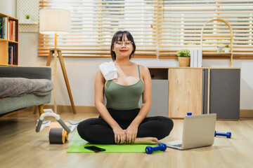 Woman meditating alone after exercising