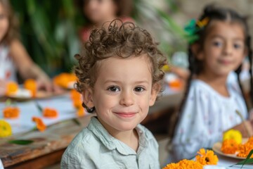 Smiling child with curly hair surrounded by flowers