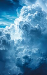 Naklejka premium Dramatic cloudscape with fluffy white clouds against a deep blue sky.