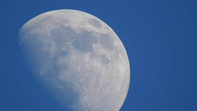 moon entering left in the daytime sky - 9 sec