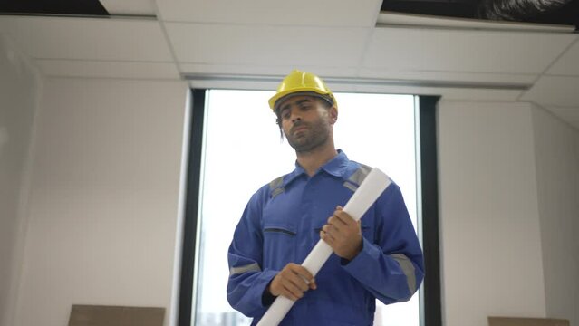 Engineer is working at tower.