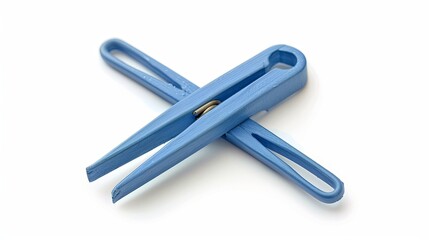 Obraz premium Blue plastic clothespins isolated on white background.