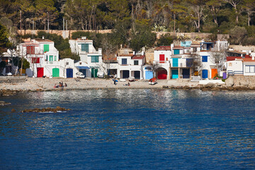 Picturesque colorful mediterranean shoreline in Girona. Salguer cove. Fisherman houses