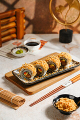 sushi is a Japanese dish of prepared vinegared rice, usually with some sugar and salt, accompanied by a variety of ingredients such as seafood, often raw and vegetables.