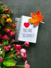 Greeting card with paper and flower
