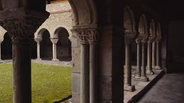 Ancient architectural details on pillars of Saint Lizier Cathedral of France. Interior view.