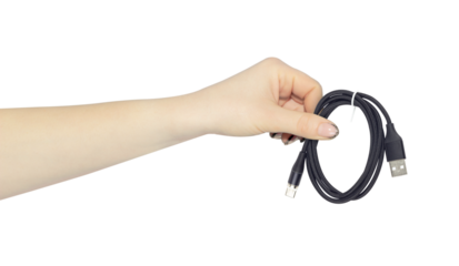 USB - Type-C cable in hand, outstretched hand with USB - Type-C cable, isolated from background