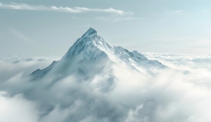 Obraz premium Snow-capped Mountain Peak Emerging from Clouds