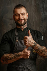 young handsome male chef showing thumbs up