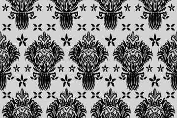 Ikat floral paisley embroidery seamless pattern on background. Ikat ethnic flower oriental pattern traditional. Aztec style abstract vector illustration. design for ikat floral fashion fabric,clothing