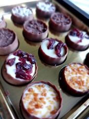 Belgium chocolate with cocoa and nuts, sweets close up food photo