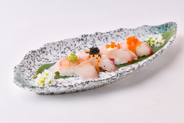 Mixed fish sushi on a plate ready to eat