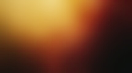 Abstract blurred gradient background in warm hues of yellow, orange, and red, creating a soft and cozy atmosphere for designs or presentations.