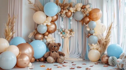 Beige, brown, and blue balloons backdrop, arch with bears. Photo-wall for celebration baptism or birthday party. Trendy autumn decor with dry leaves.