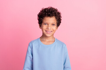 Photo of handsome good mood grandson wear blue sweater smiling emtpy space isolated pink color...
