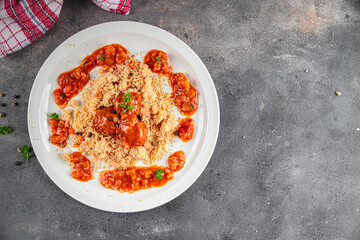 couscous with meat balls vegetable sauce tasty fresh meal food snack on the table copy space food background rustic top view keto or paleo diet