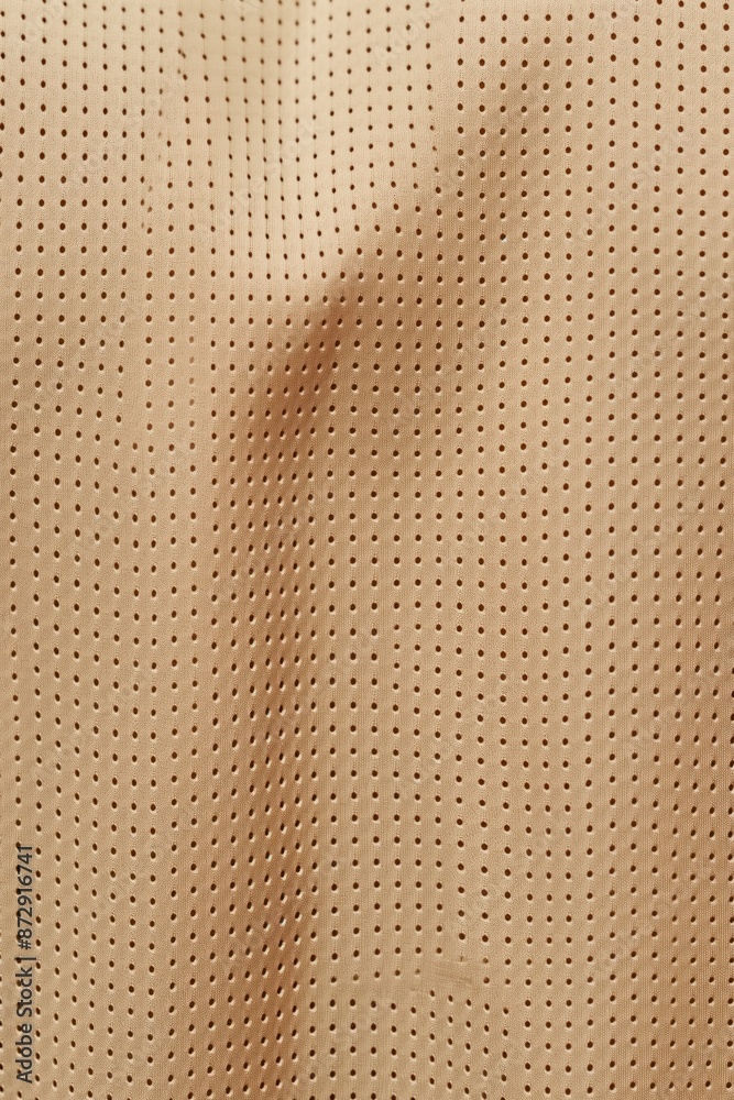 Poster beige fabric texture close-up. soft smooth material with small holes pattern. uniform appearance. su